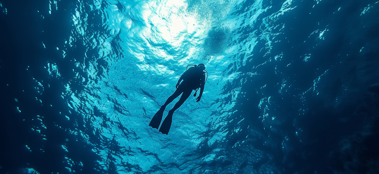 Scuba Diver in dark waters