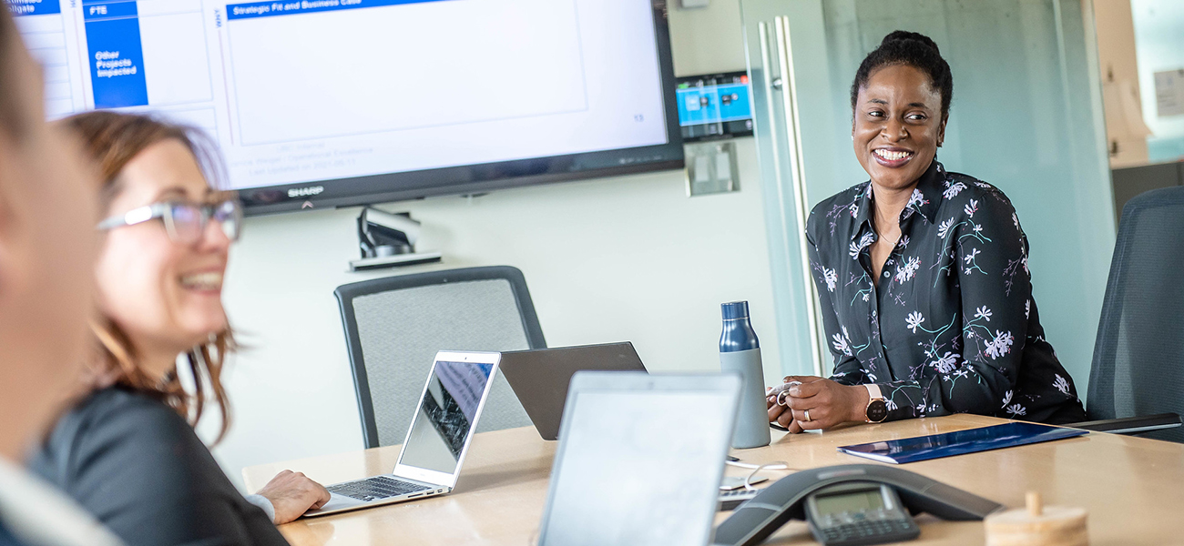 UBC staff in board meeting