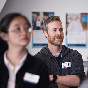 UBC staff listening to presentation