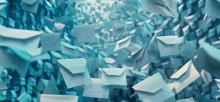 Hurricane of paper envelopes representing vast amount of emails